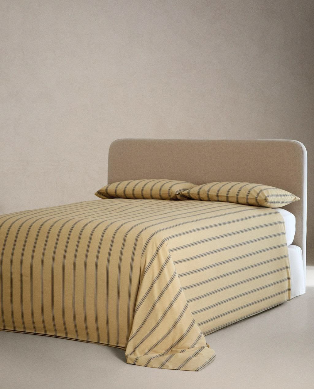 Handloom striped bed sheets in warm tones
